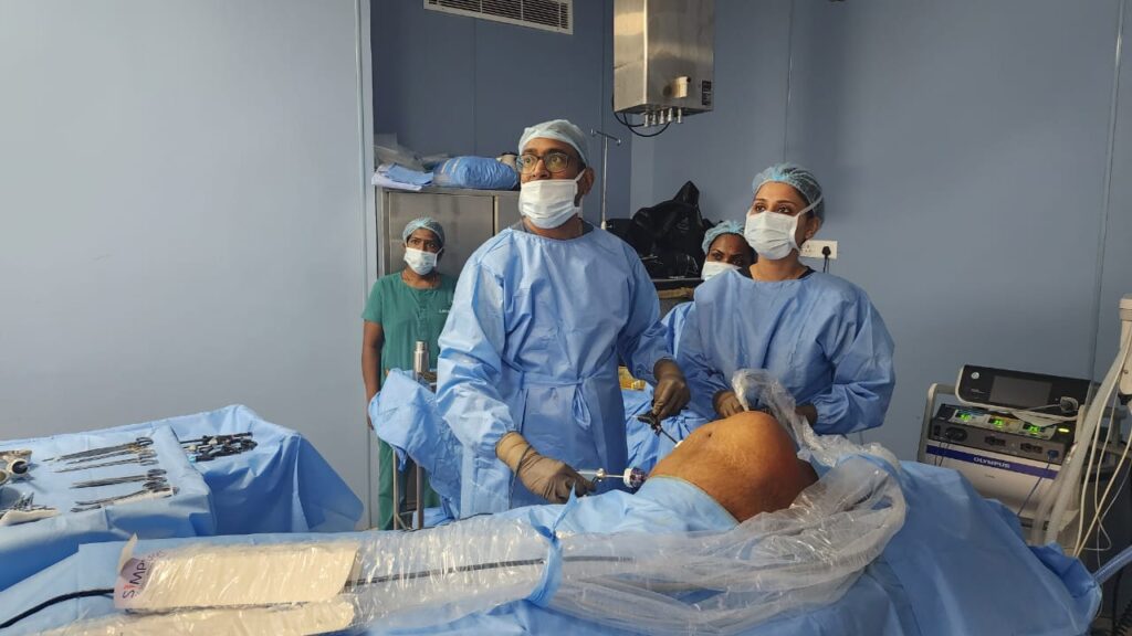 Dr. Sujeeth Bashetty performing laparoscopic surgery in the operation theatre